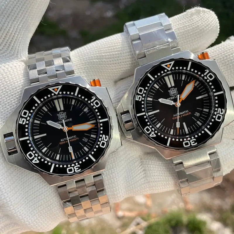 two watches on a white glove