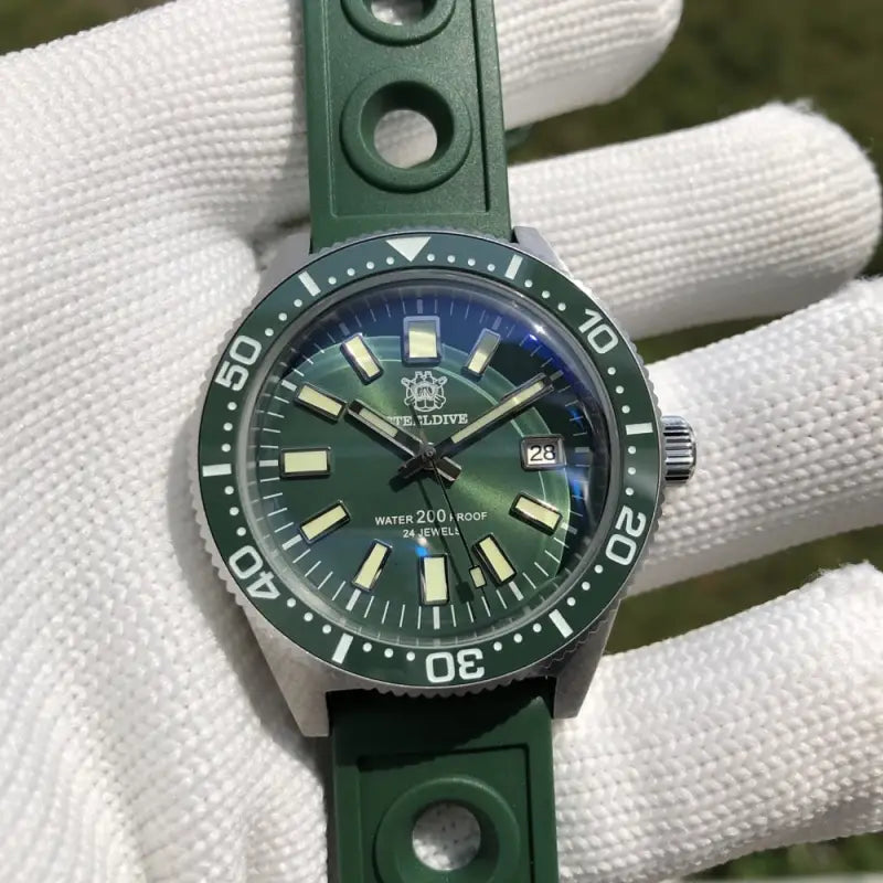 a watch with a green strap on it