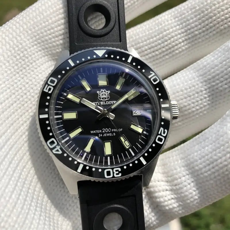 a watch with a black dial on it